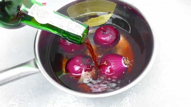 Roasted Red Onions: poached in port wine, grilled and sprinkled with fresh thyme... Roasted Red Onions: poached in port wine, grilled and sprinkled with fresh thyme...