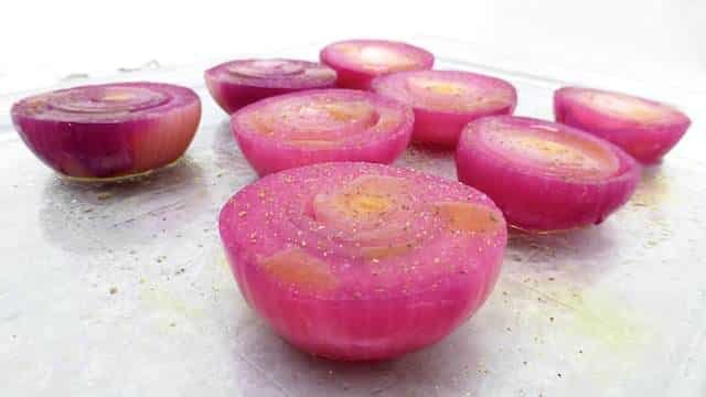 Roasted Red Onions: poached in port wine, grilled and sprinkled with fresh thyme... Roasted Red Onions: poached in port wine, grilled and sprinkled with fresh thyme...